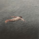 Painting of naked diver in mid-air