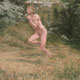 Painting of nude man running through long grass